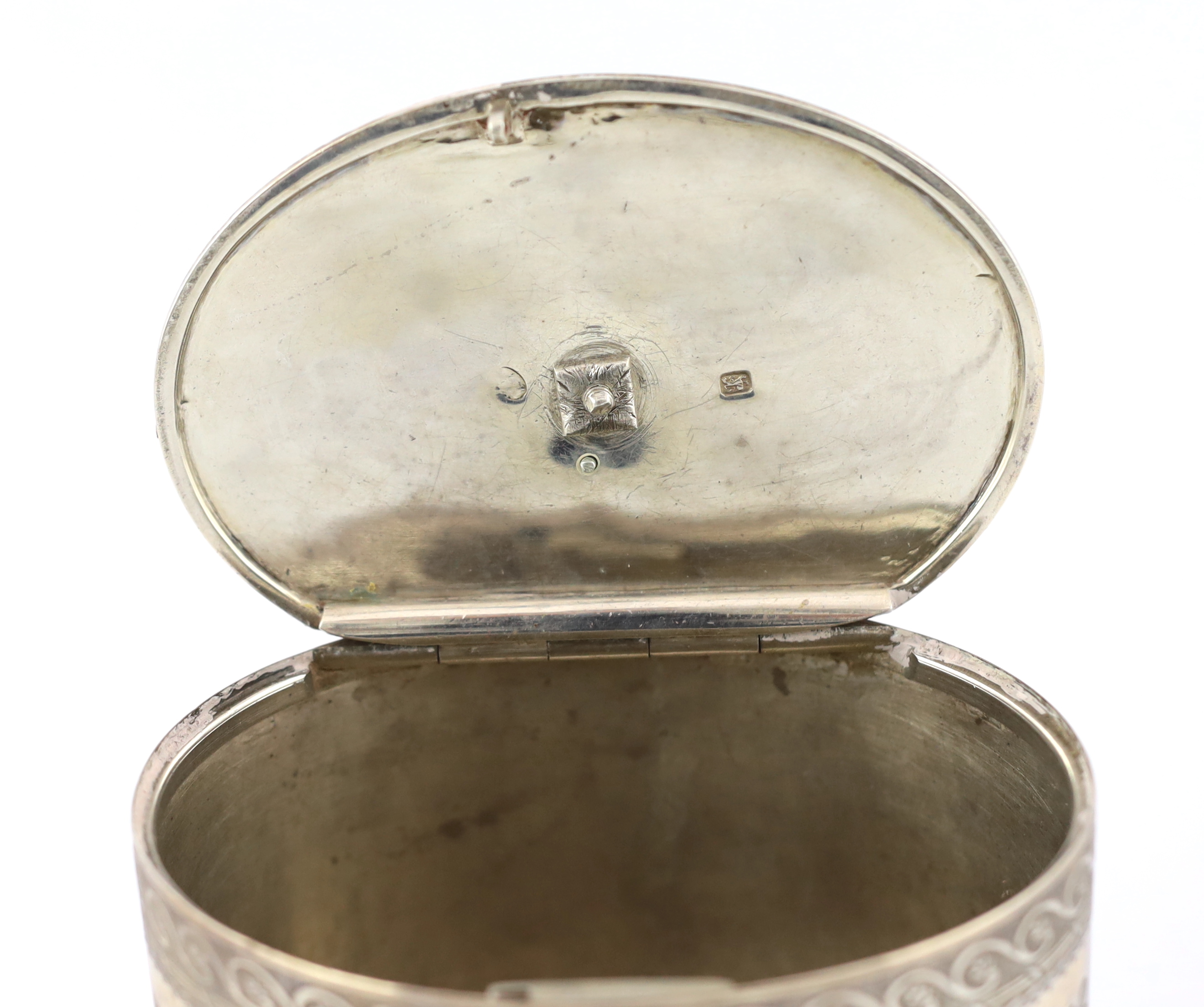 A George III engraved silver ova tea caddy, by Thomas Daniell